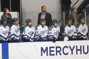 Photo by Ethan Magoc: The women's hockey team will host several charitable offerings this weekend for injured assistant coach Kristen Cameron, pictured above left during the team's NCAA Quarterfinal in March
